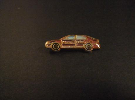 Nissan Primera middenklassenauto bruin
